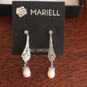 Cubic zirconia earrings with a pearls. Brand new